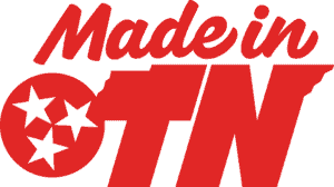 Red text reads “Made in TN.” The “O” contains three black stars, referencing the Tennessee state flag symbol. The right edge of the N resembles the shape of Tennessee.