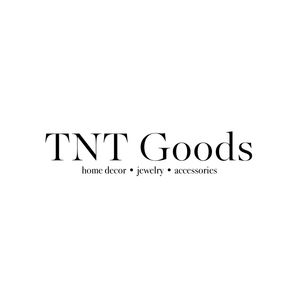 TNT Goods logo with the tagline: home decor • jewelry • accessories, displayed in black text on a solid green background.