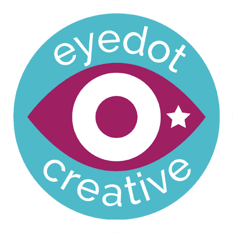 A circular logo with a blue background, featuring a stylized maroon eye with a white dot in the center and a small white star on the right. The words eyedot creative are written in white around the eye.