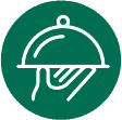 White line drawing of a hand holding a covered serving tray, inside a green circle. The image suggests food service or catering.