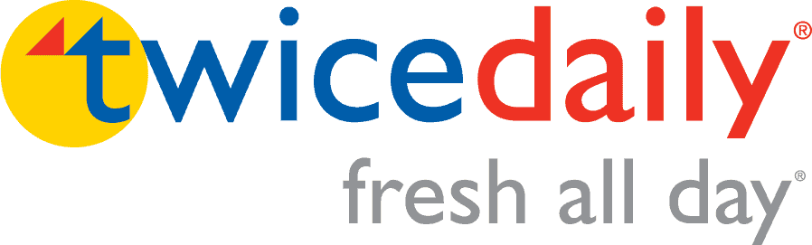 Logo for twice daily with twice in blue and daily in red. The t is inside a yellow circle with two blue and red triangles above. Below, gray text reads fresh all day.