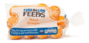 A clear plastic bag of Food Lion Feeds Navel Oranges. The label says buying the bag will provide 5 meals to a local food bank. The oranges and part of the logo are visible through the packaging.